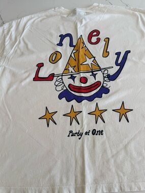 LONELY GHOST White Graphic Tee with Yellow, Red & Blue Clown Print